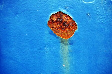 close up photography of a rusty metal wall の写真素材