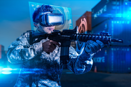 The abstract image of the soldier use a VR glasses for combat simulation training overlay with the...