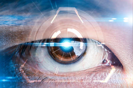 The double exposure image of the businessman looking through the futuristic hologram. The concept of modern life, technology, iris scanner and internet of thingsの写真素材
