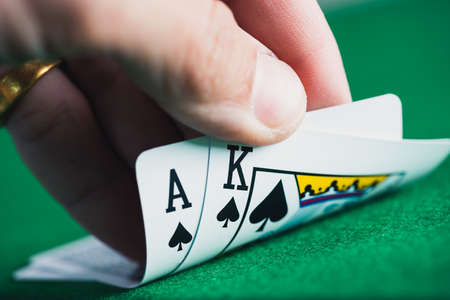 the play cards laying on the poker table in casinoの写真素材