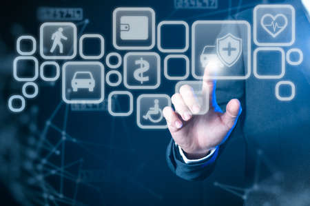 The businessman point to the insurance futuristic hologram. the concept of communication, network,...