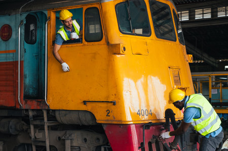 the portrait of the technician in the train garage