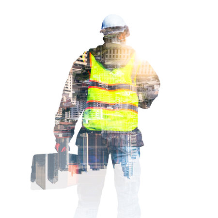The double exposure image of the engineer thinking overlays with cityscape image with copy space. The concept of engineering, construction, futuristic and industry.の写真素材