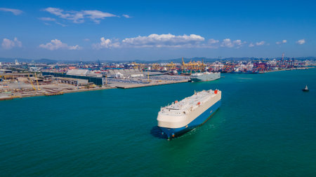 the image provides a stunning aerial view of a bustling cargo ship port, where massive vessels dock and unload their precious cargo.の写真素材