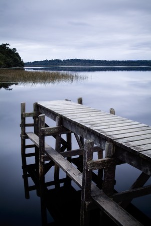 Empty and serene jetty on a moody winters dayの写真素材