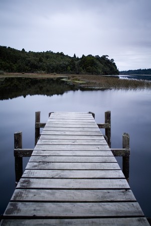 Empty and serene jetty on a moody winters dayの写真素材