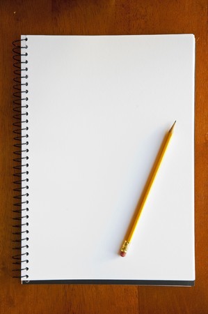 A large spiral bound notebook with blank pagesの写真素材
