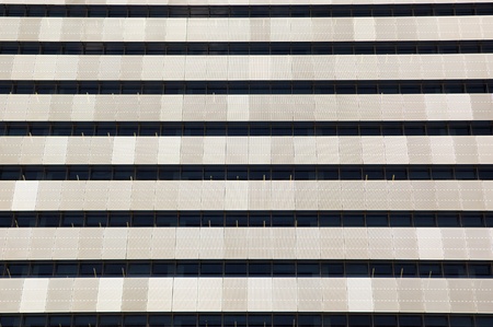 The exterior of an office building creates pattern and textureの写真素材