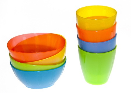 Group of brightly coloured plastic cupsの写真素材