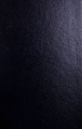 Dark texture of vinyl with a ray of lightの写真素材