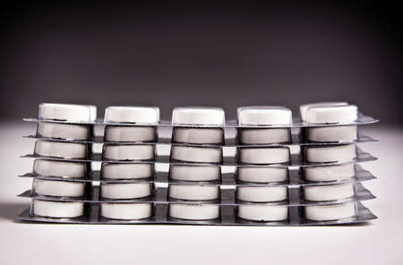 Packs of generic medicine with dark lightingの写真素材