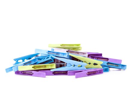 Colorful pegs isolated on whiteの写真素材