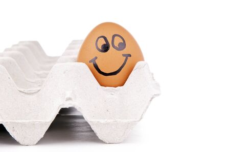 Eggs with human characteristics isolated on white as conceptの写真素材