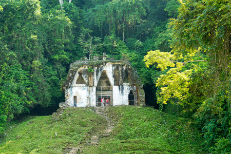 PALENQUE, MEXICO - NOVEMBER 29: Unknown people explore the mayan temple ruins surrounded by dense jungle on November 29, 2016 in Palenque. Palenque was declared a world heritage site by UNESCO in 1987.のeditorial素材