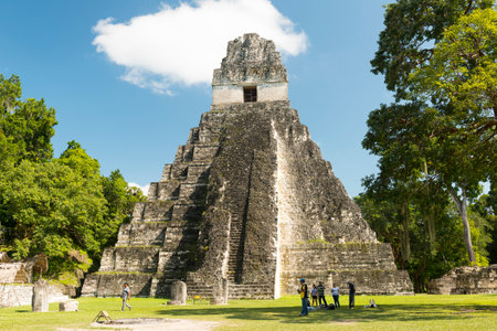 TIKAL, GUATEMALA - NOVEMBER 26: Unidentified people veiw Temple I, also known as the Jaguar Temple, in Tikal National Park on November 26, 2017 in Tikal.のeditorial素材