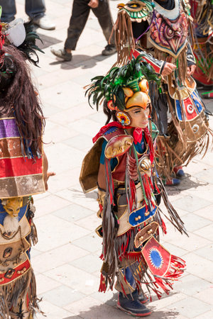 SAN JUAN OSTUNCALCO, GUATEMALA - JUNE 24: Traditional dance done by locals with elaborate costumes and masks at the San Juan Ostuncalco fair in honor of Saint John the Baptist on June 24, 2017 in Guatemala.のeditorial素材