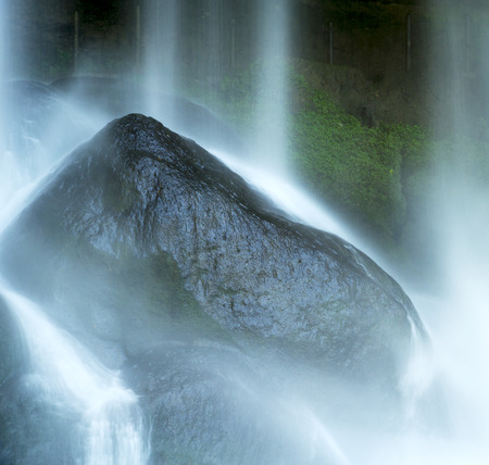 Waterfall on rocks at the bottom of Misol Ha, Palenque, Chiapas, Mexicoの写真素材