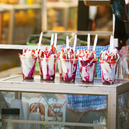 Strawberries and cream dessert for sale a town fair in Guatemalaの写真素材