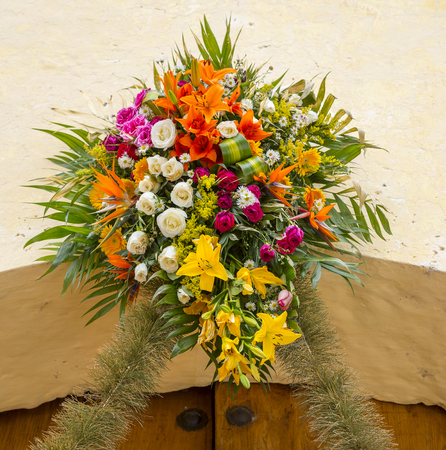 Floral bouquet over wooden door archwayの写真素材