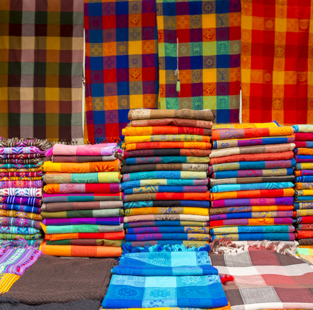 Bright woven material in a craft market as a background pattern