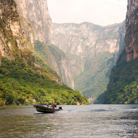 Tourists in tour boat travel through the Sumidero Canyon Chiapas, Mexicoのeditorial素材