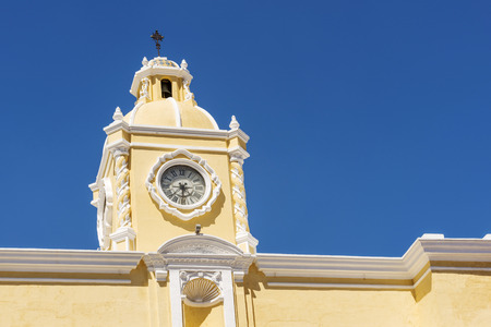 The Arco de Santa Catalina clock tower in Antigua, Guatemala in Central Americaの写真素材