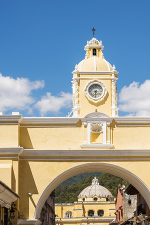 The Arco de Santa Catalina clock tower in Antigua, Guatemala in Central Americaの写真素材