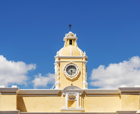 The Arco de Santa Catalina clock tower in Antigua, Guatemala in Central Americaの写真素材