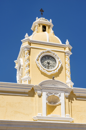 The Arco de Santa Catalina clock tower in Antigua, Guatemala in Central Americaの写真素材