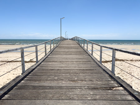 Historic Largs Jetty on Largs Beach in Adelaide, South Australiaの写真素材