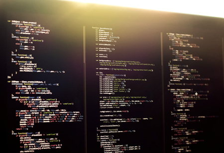 web development, writing js code, office, laptopの写真素材