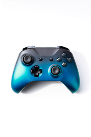 Blue black gradient gamepad from the game console isolated on a white background,の写真素材