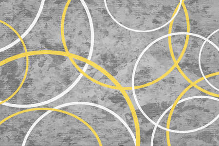 White and yellow rings on gray textured backgroundの写真素材