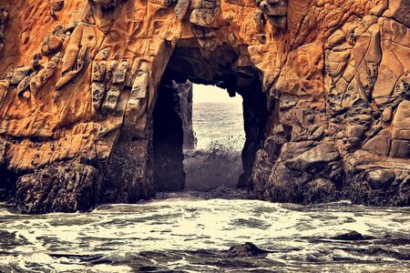big stone hole at pfeiffer beach big sur california USAの写真素材