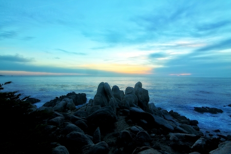 rock ocean and sunset skyの写真素材