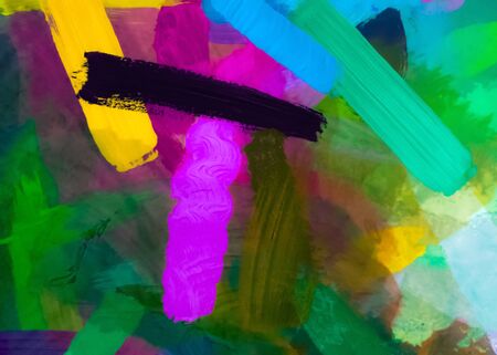 splash painting texture abstract background in green purple yellowの写真素材