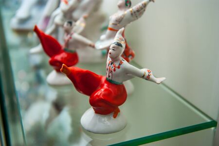 Porcelain rare figures standing in a glass caseの写真素材