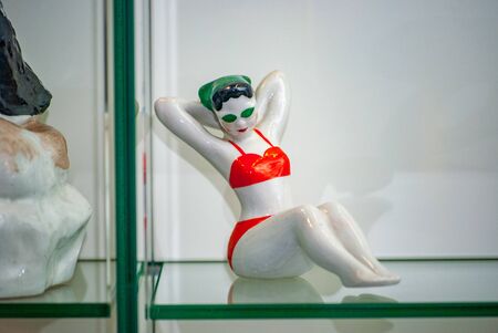 Porcelain rare figures standing in a glass caseの写真素材