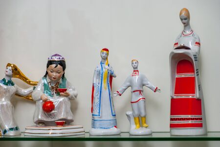 Porcelain rare figures standing in a glass caseの写真素材