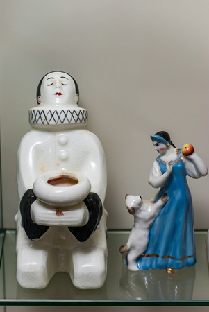 Porcelain rare figures standing in a glass caseの写真素材