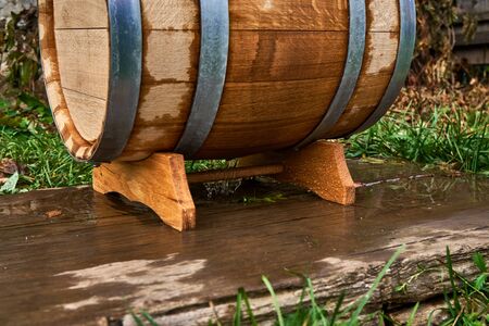 Oak barrel is washed before use