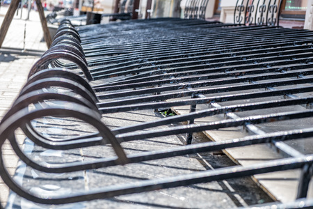 Beautiful wrought iron grating on the window pit