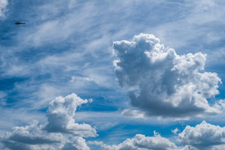 Cirrus and ordinary clouds in a shuffle and a helicopter