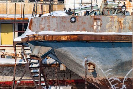 Abandoned rusty ships ahead of sawing for scrapの写真素材
