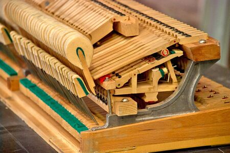 Wooden hammers of the old disassembled grand pianoの写真素材