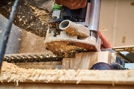 Manual milling machine in the process of work in the workshopの写真素材
