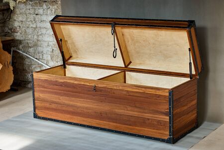 Wooden chest made of solid teak and aged metalの写真素材