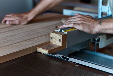 Panel squaring saw before sawing a thick edged oak boardの写真素材