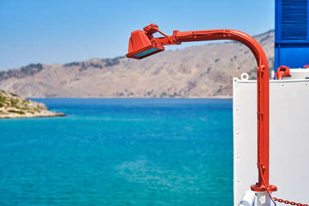 Red lantern on the deck of a large sea ferryの写真素材