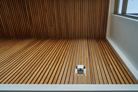 Wooden wall slats from walnut in the interiorの写真素材